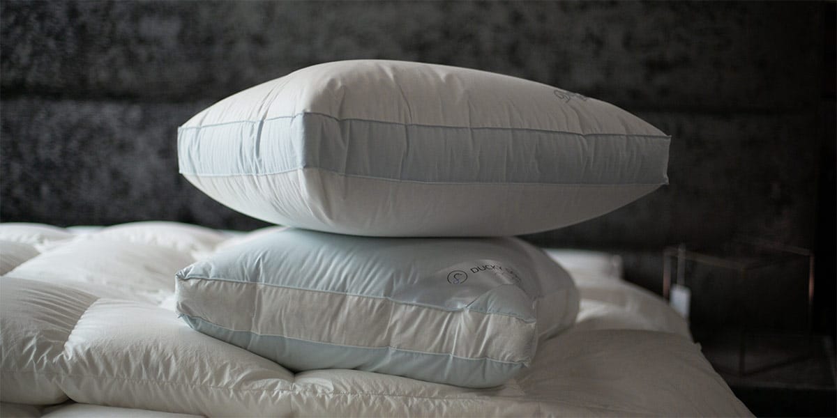 voorbeeld van hoofdkussens op een bed